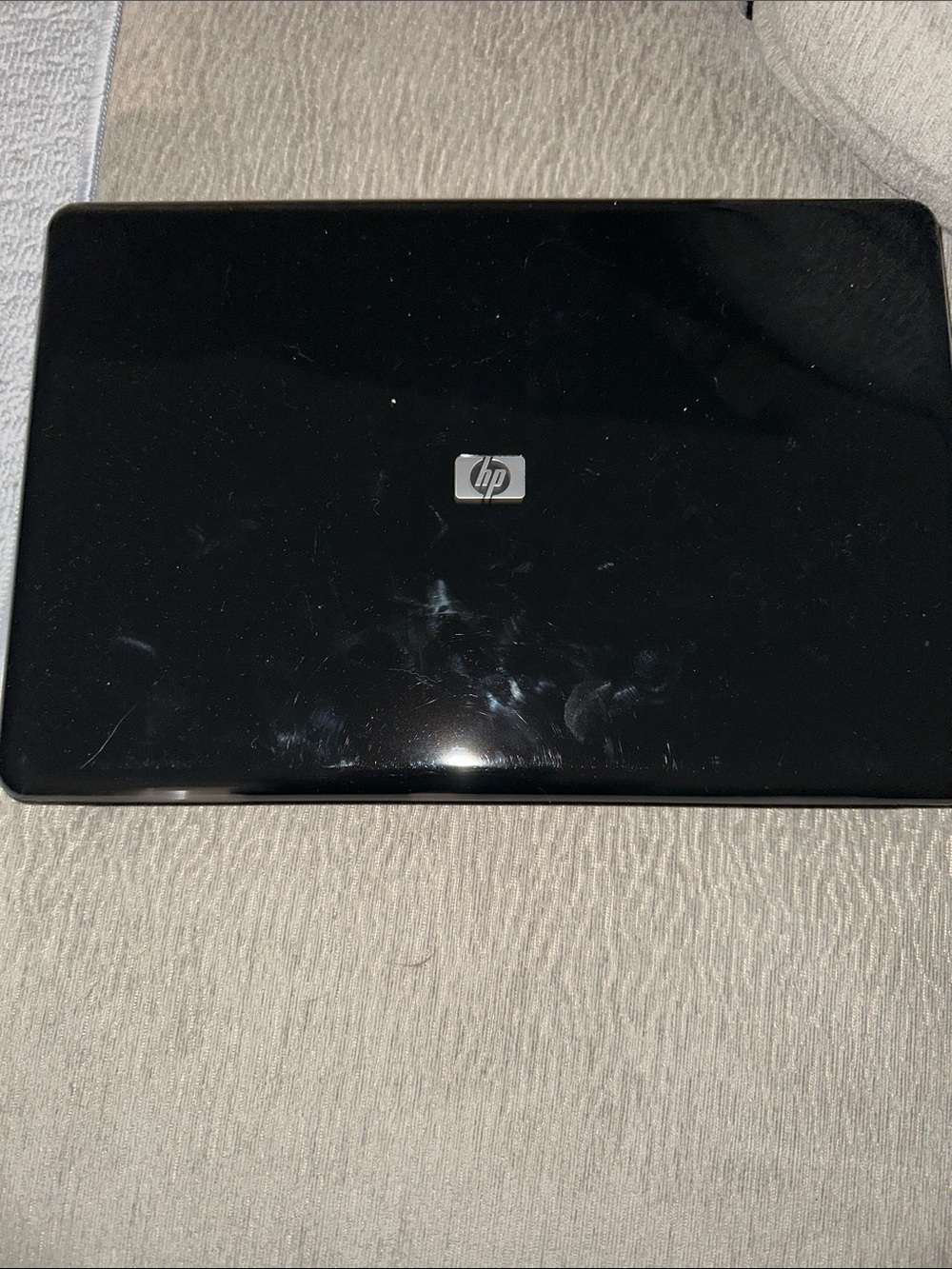 HP Black Glossy Laptop with Silver Logo with Zorion os lite